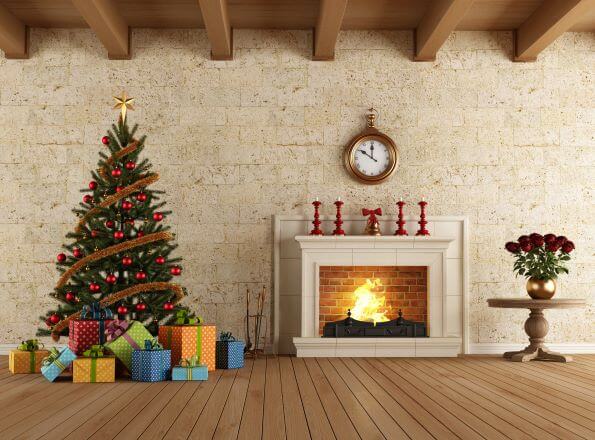 Christmas tree with presents and a warm fire