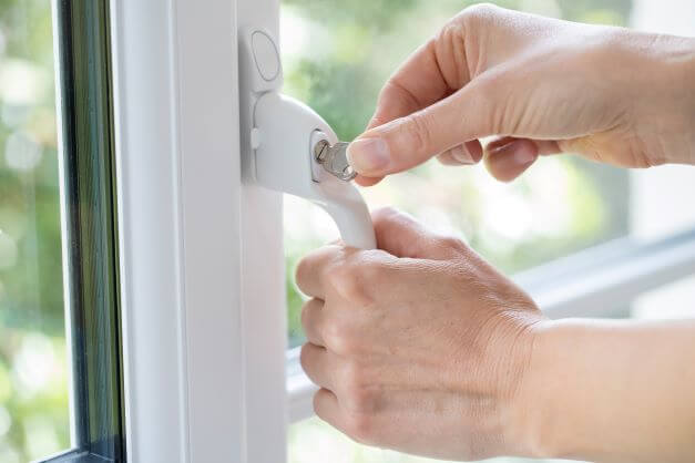 Hand locking a window